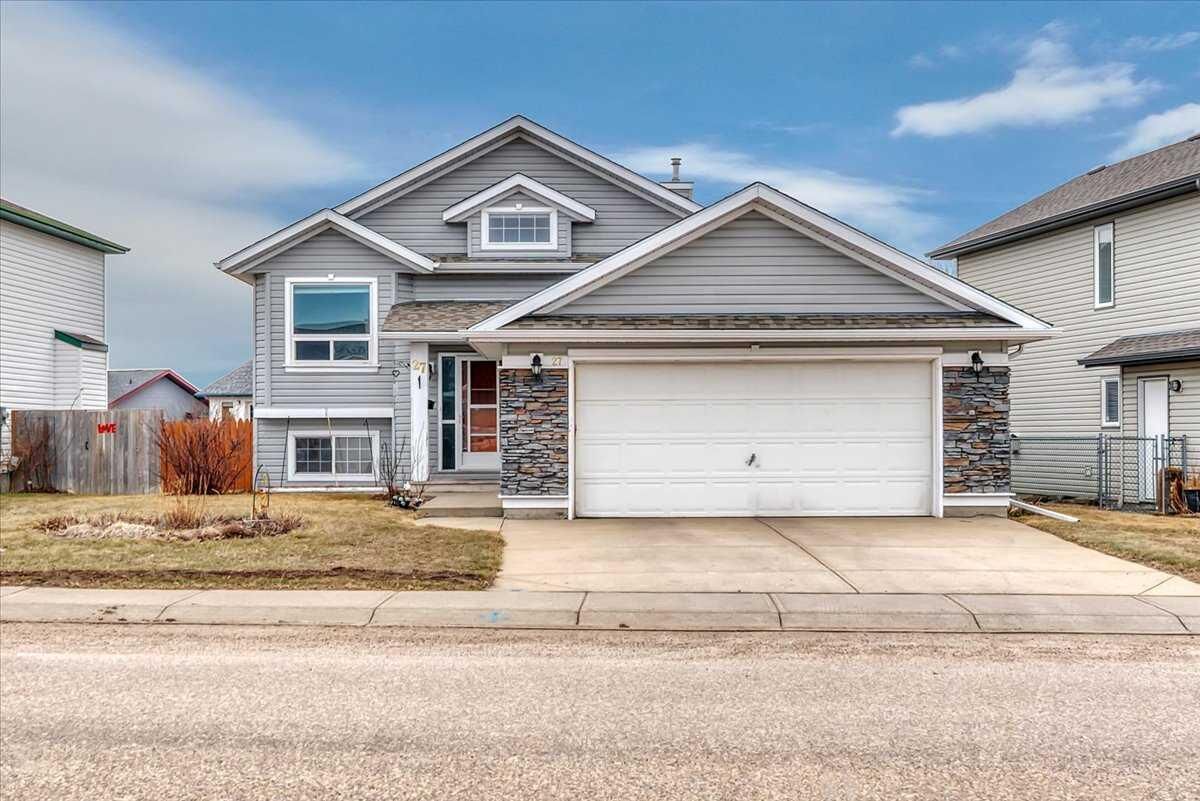 Property Photo: 27 Aspen Creek Way AB T1P 1R2