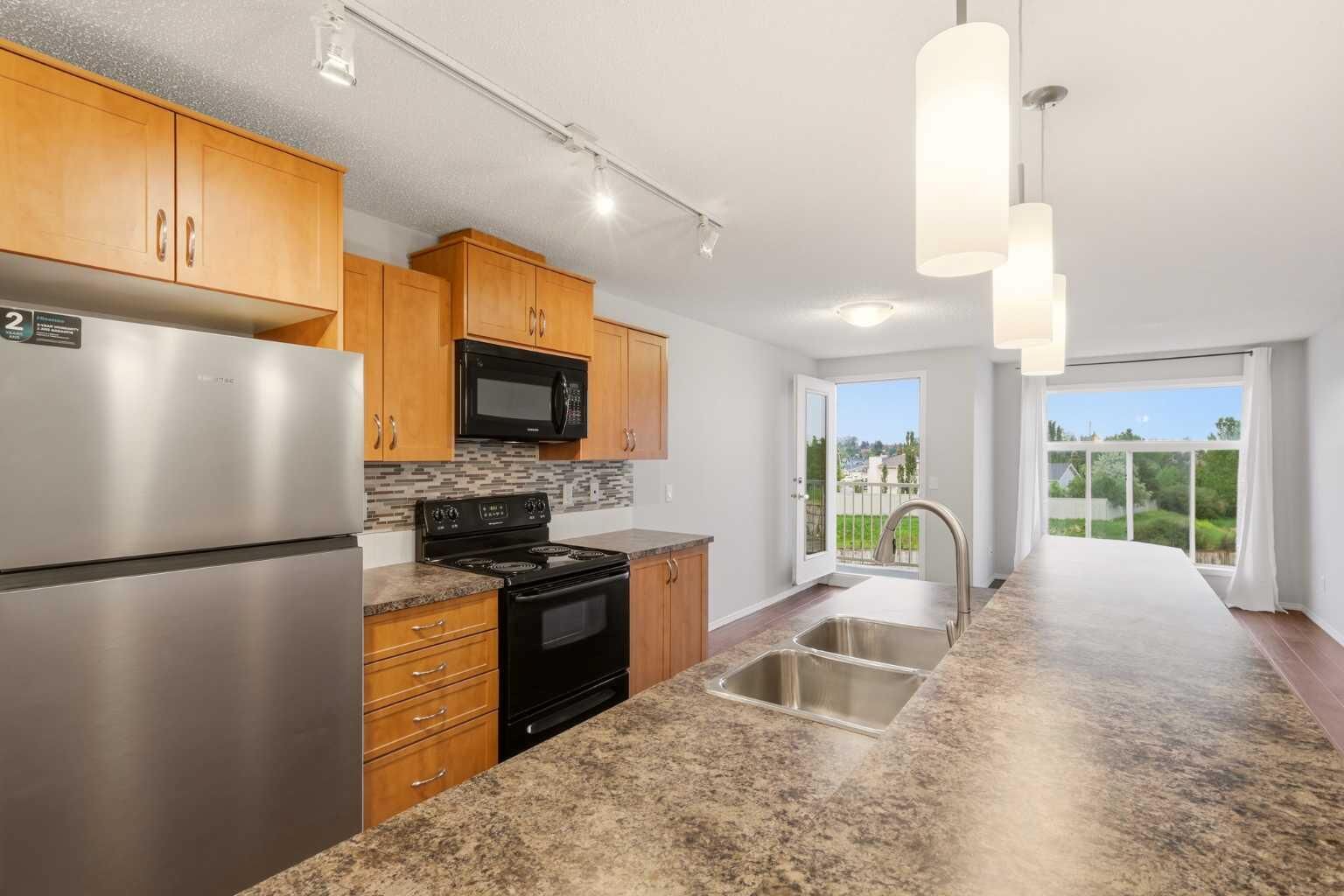 Property Photo: 700 Willowbrook Road NW 2323 AB T4B 0L5