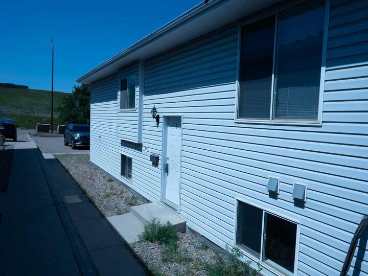 Property Photo:  64 Valleyview Drive SW  AB T1A 8N6 