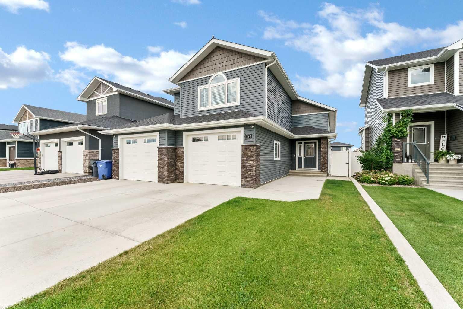 Property Photo: 127 Hamptons Crescent SE AB T1B 0P4