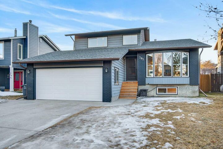 Property Photo: 303 Woodside Place AB T1S 1L9