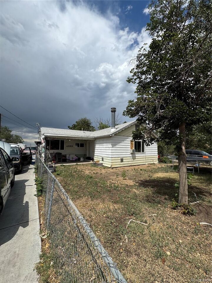 Property Photo:  4889 W Tennessee Avenue  CO 80219 