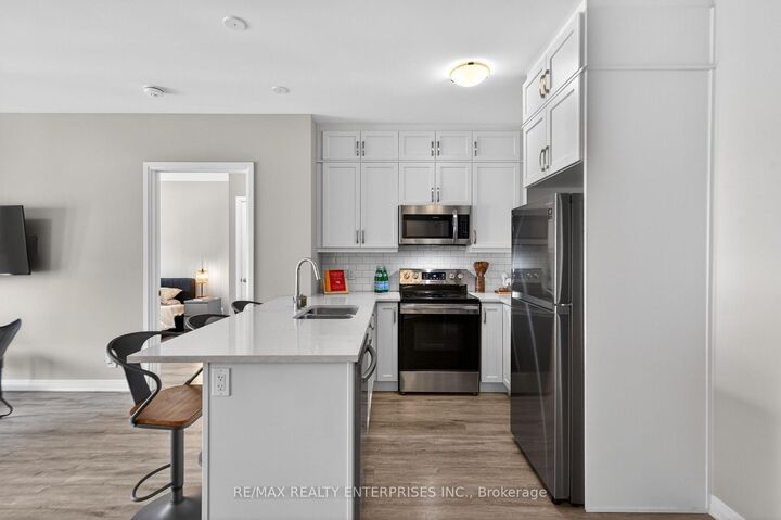 Property Photo: 102 Grovewood Common 510 ON L9H 0X2