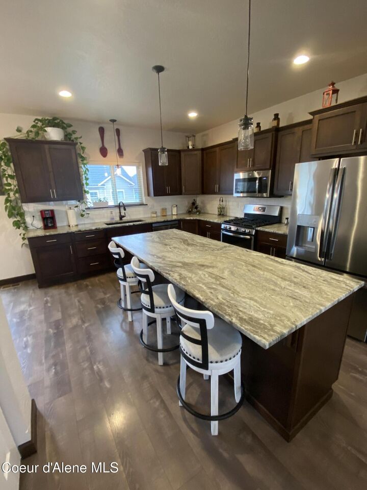 Property Photo:  8010 N Darlena Loop  ID 83815 