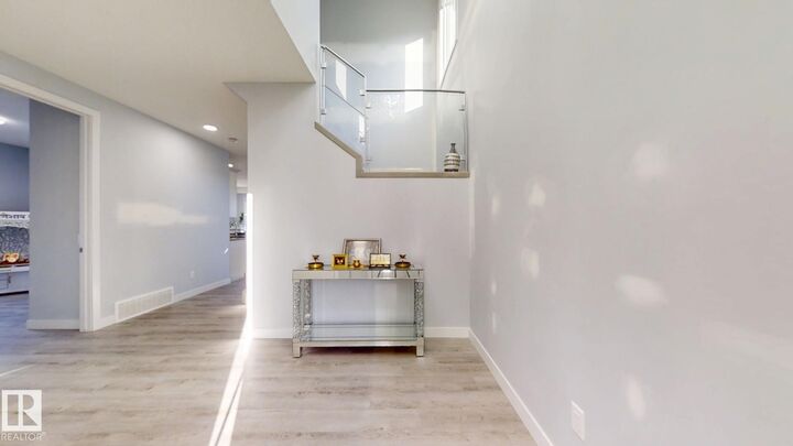 Property Photo:  215 Glenridding Ravine Road SW  AB T6W 5C2 