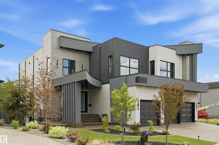 Property Photo: 4081 Whispering River Drive SW AB T6W 2E2