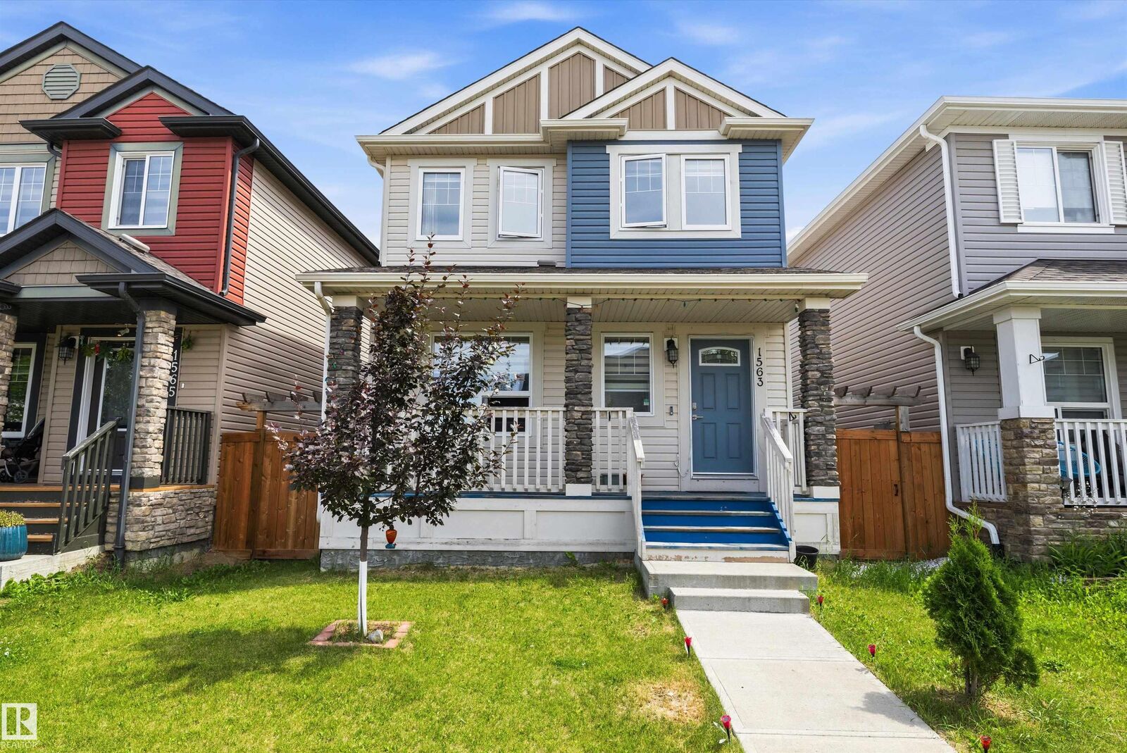 Property Photo: 1563 Tamarack Boulevard NW AB T6T 2E2