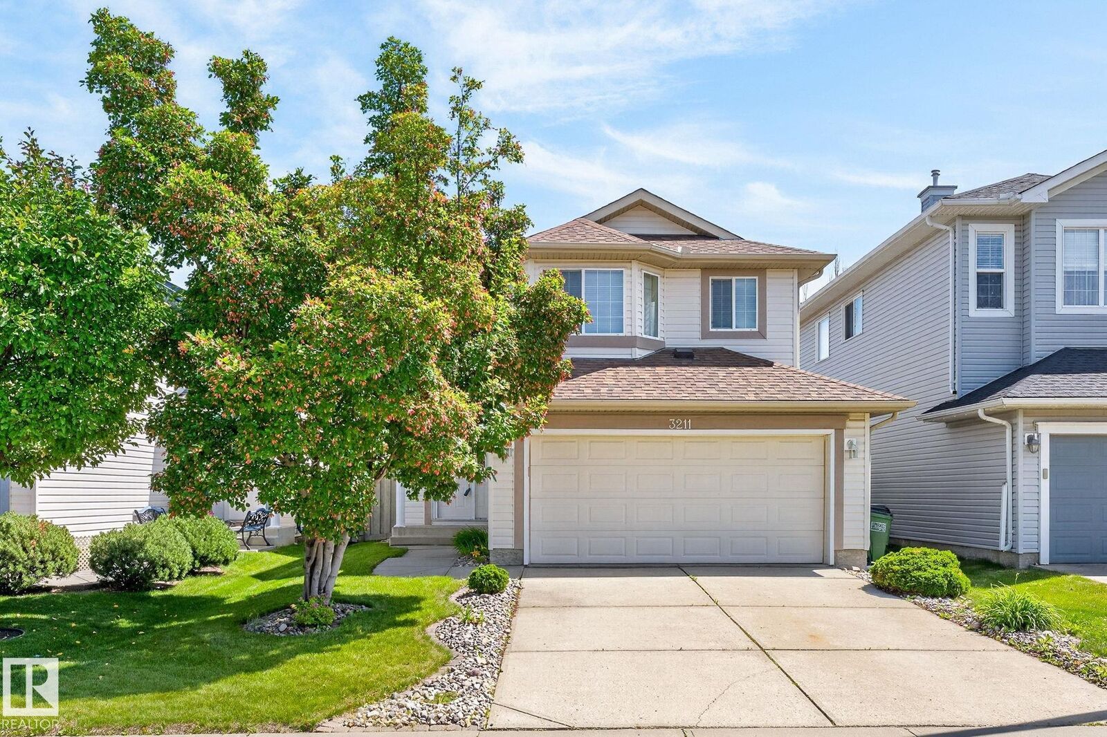 Property Photo: 3211 McPhadden Place SW AB T6W 1L1