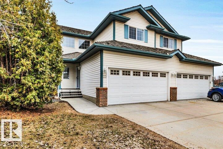 Property Photo: 211 Blackburn Drive SW 23 AB T6W 1C6