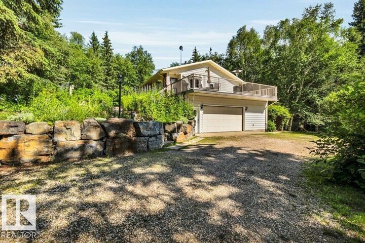 Property Photo: 27-51128 Rge Rd 261 AB T7Y 1B8