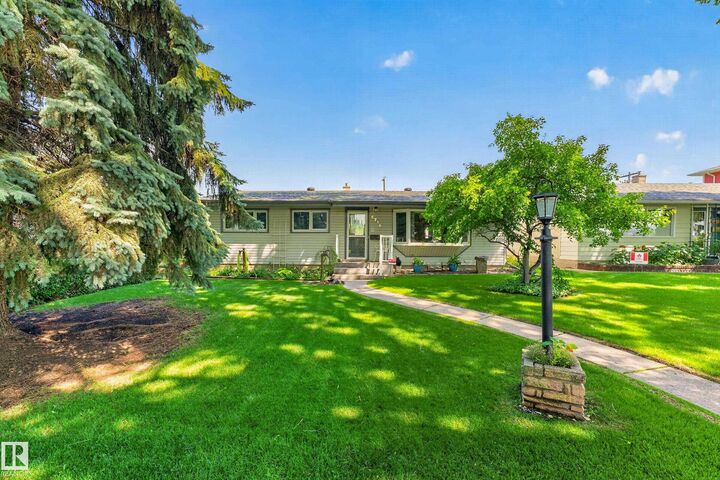 Property Photo:  6716 101A Avenue NW  AB T6A 0M2 