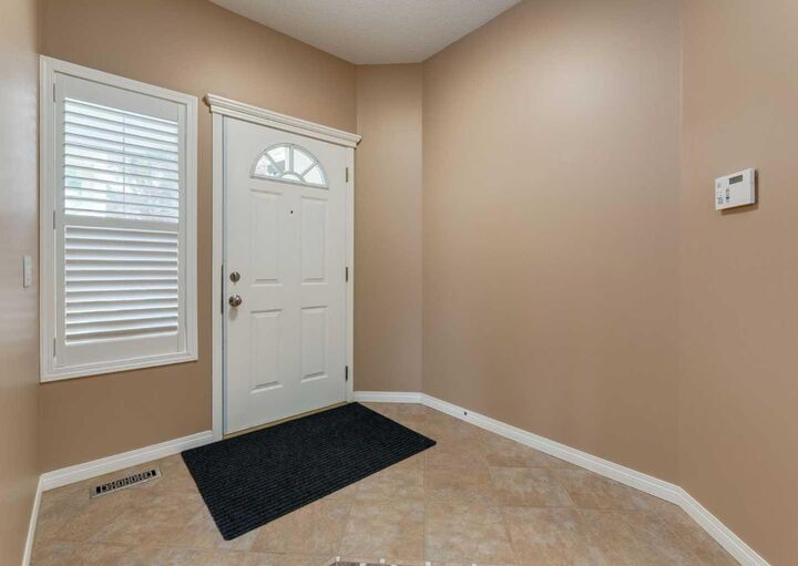 Property Photo: 115 Scimitar Heath NW AB T3L 2E1