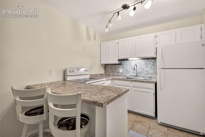 Property Photo: 2430 Palmer Park Boulevard 103 CO 80909
