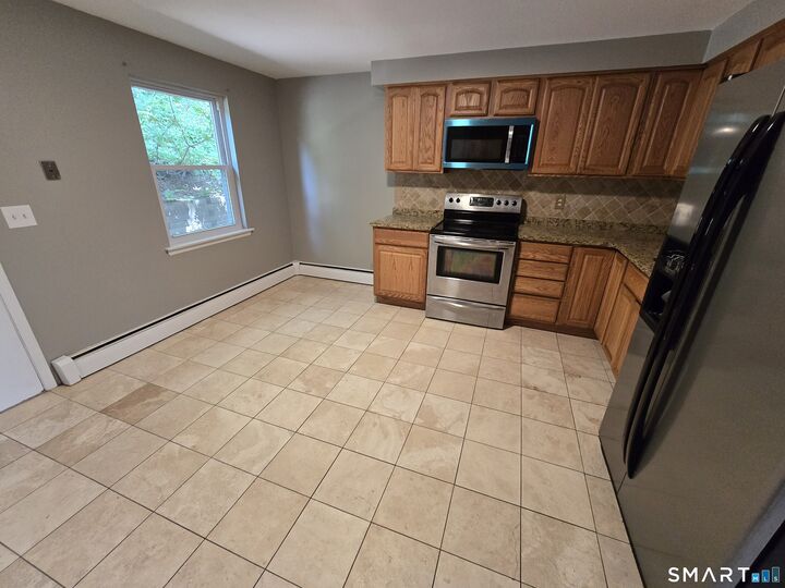 Property Photo:  65 Terrace Gardens 65  CT 06492 