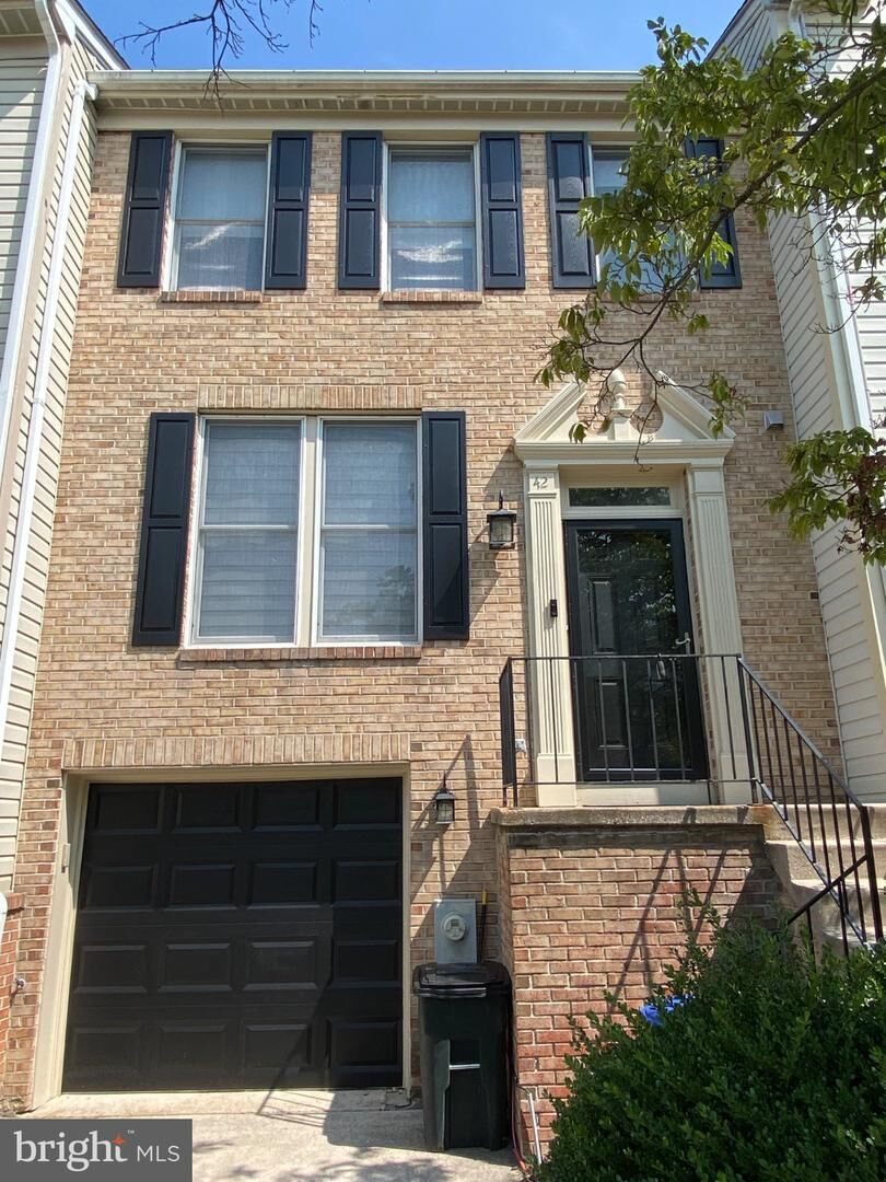 Property Photo:  42 Championship Court H-10  MD 21117 