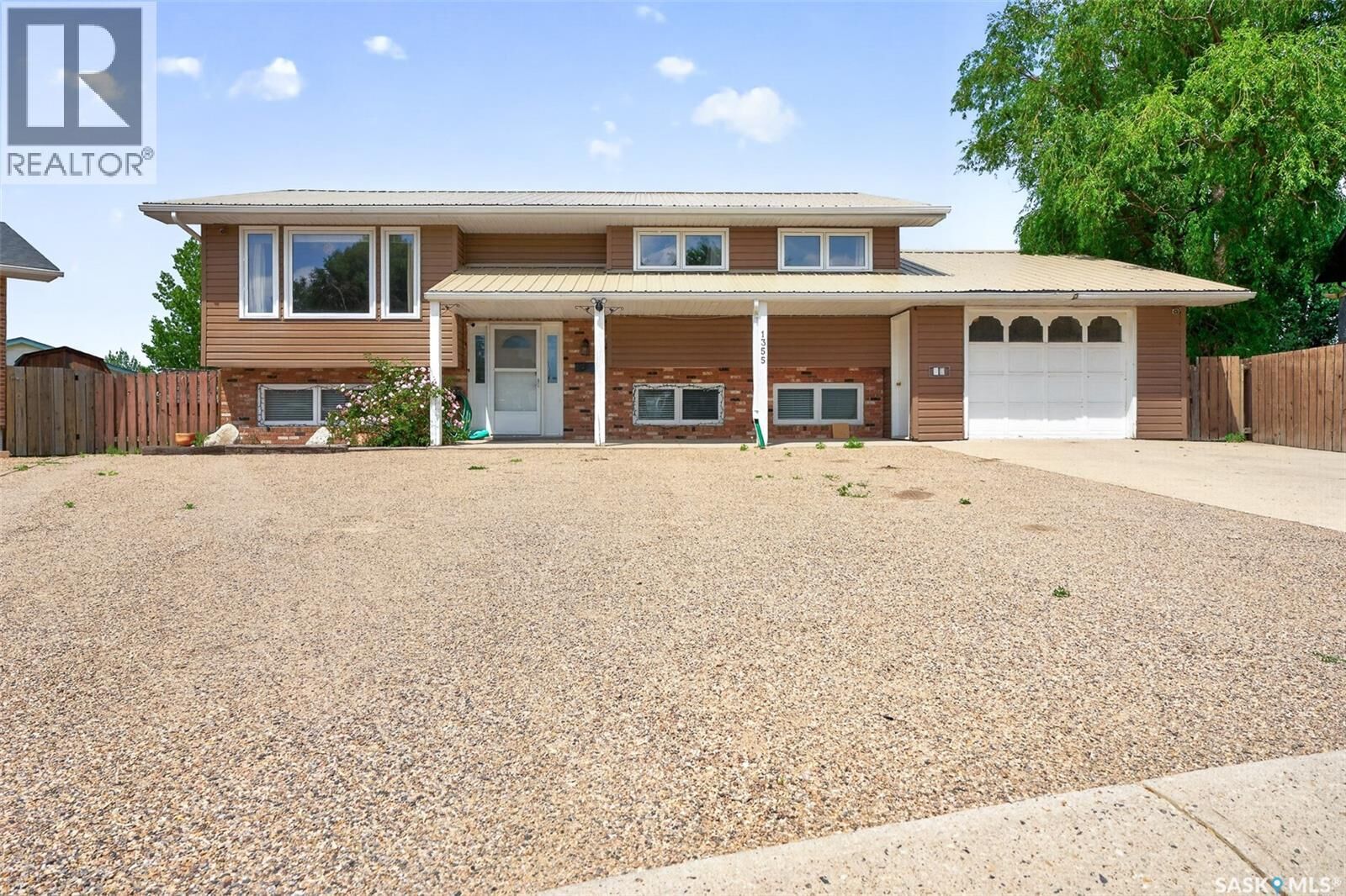 Property Photo:  1355 Manitou Crescent  SK S6H 7C4 