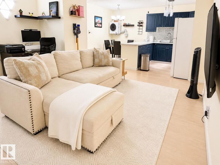 Property Photo: 11825 71 Street NW 101 AB T5B 1W4