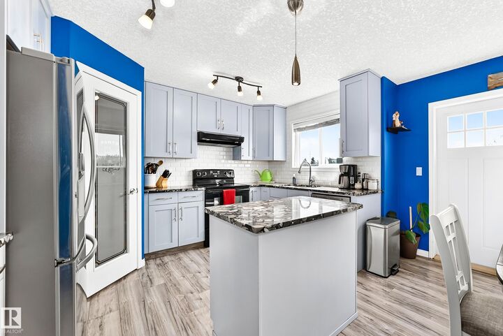 Property Photo: 108 Houle Drive AB T8R 0E1