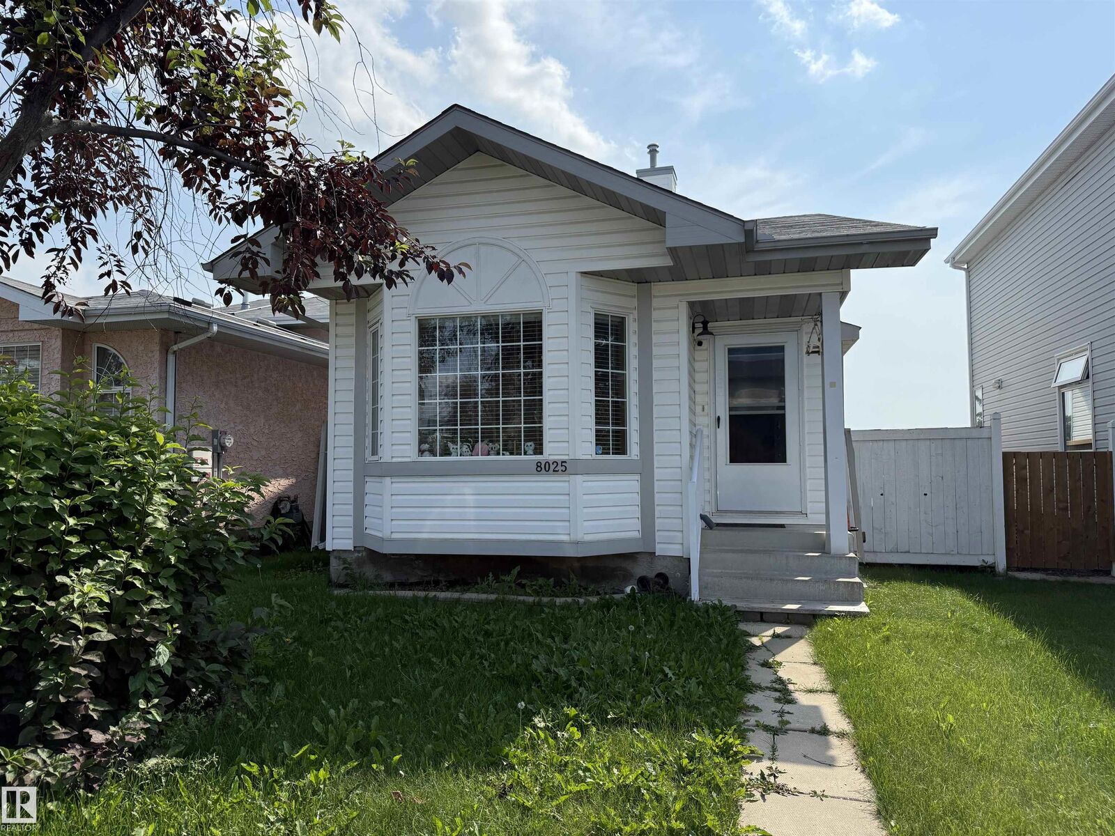 Property Photo:  8025 15A Avenue NW  AB T6K 4E2 