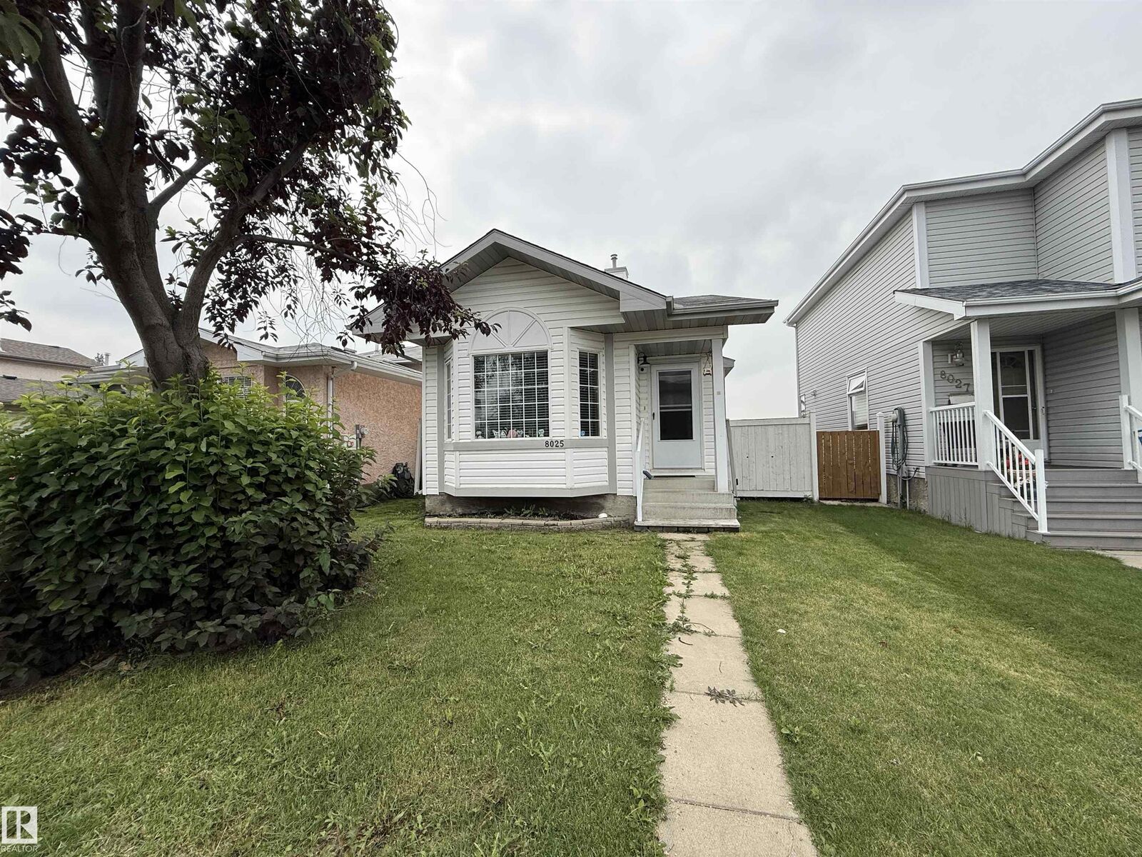 Property Photo: 8025 15A Avenue NW AB T6K 4E2