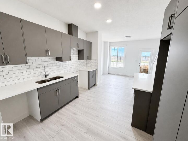 Property Photo:  7110 Keswick Common SW 38  AB T6W 5P7 