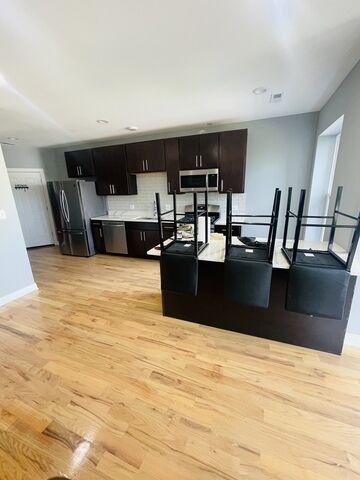Property Photo: 1411 E 67th Place 3E IL 60637