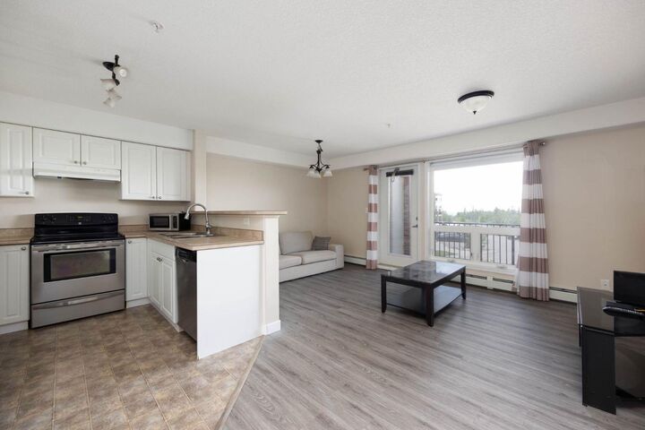 Property Photo:  248B Grosbeak Way 202  AB T9K 0V9 