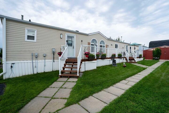 Property Photo: 107 Cree Lane AB T9K 1Y5