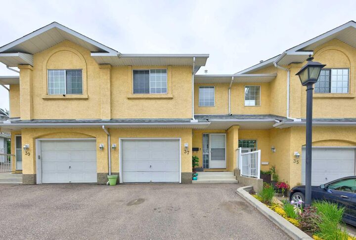 Property Photo: 37 Beddington Gardens NE AB T3K 4N9