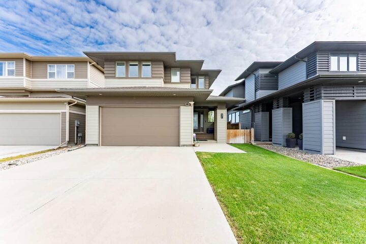 Property Photo: 437 Devonia Way W AB T1J 5J7
