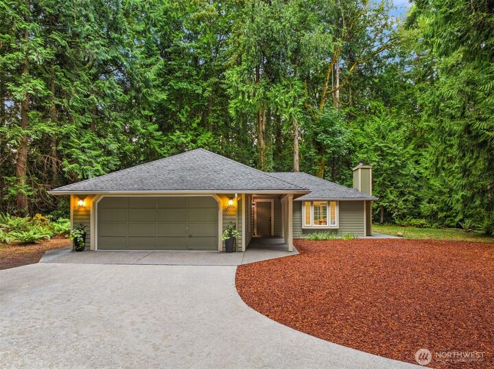 Property Photo:  9067  Hidden Cove Road NE  WA 98110 