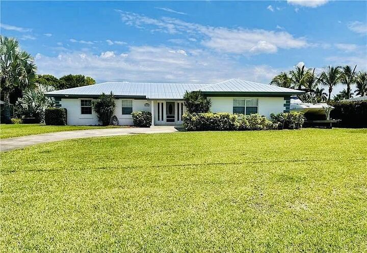 Property Photo:  416 SE Naranja Avenue  FL 34983 