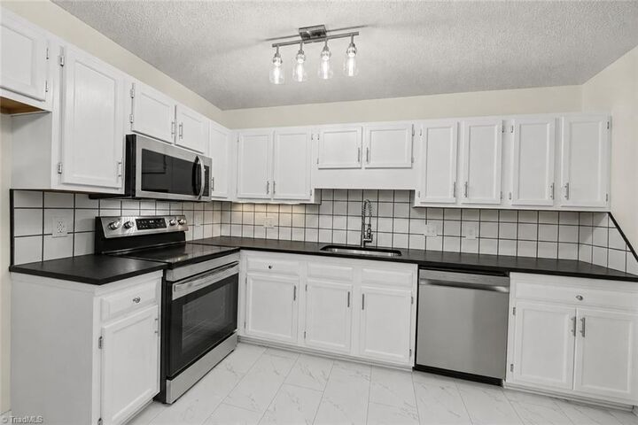Property Photo: 1960 Old Hollow Road NC 27051
