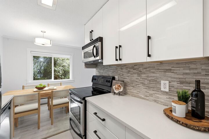 Property Photo: 211 W 3rd Street 112 BC V7M 1E9