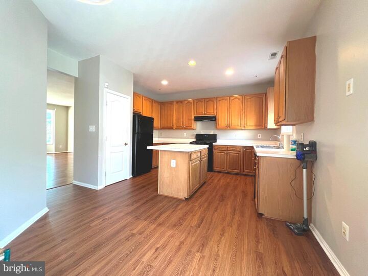 Property Photo: 1727 Wood Carriage Way 105 MD 21144