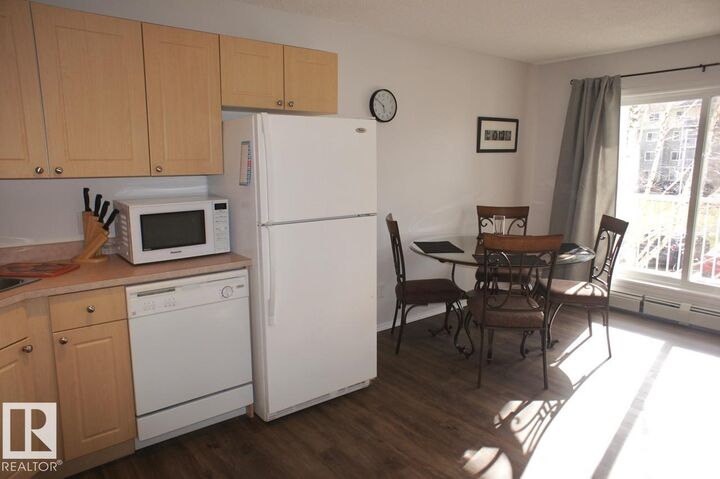 Property Photo: 70 Woodsmere Close 219 AB T8L 4R8