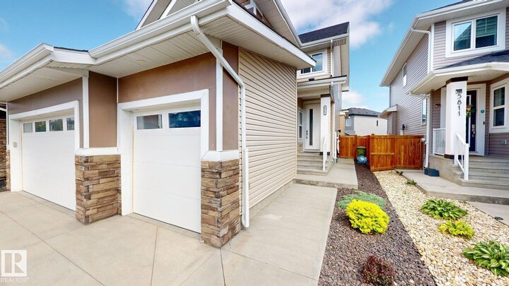 Property Photo: 5813 Pelerin Crescent AB T4X 2X8