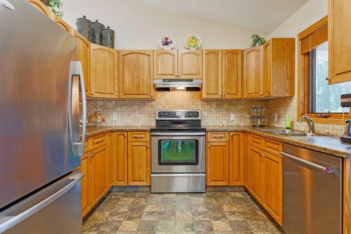 Property Photo: 110 Heritage Boulevard W AB T1K 6R9