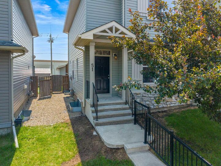 Property Photo: 51 Covehaven Mews NE AB T3K 0E2