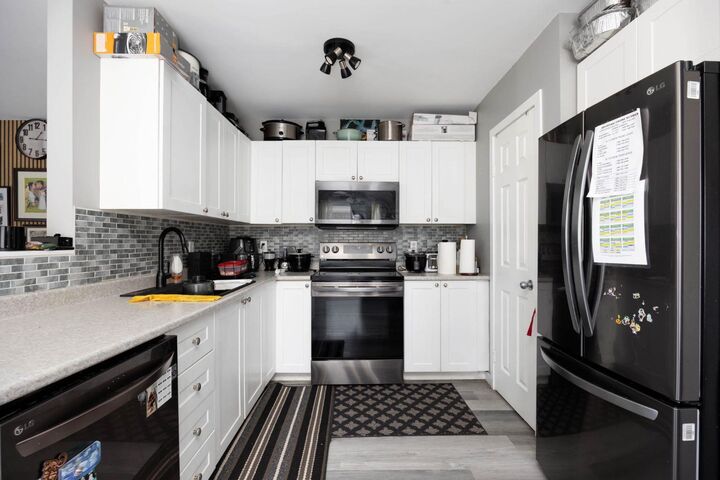 Property Photo: 100 Paish Place 5 AB T9K 2W4