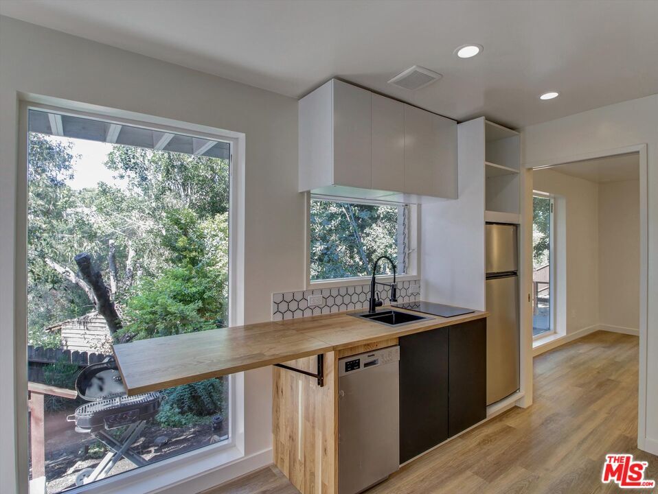 Property Photo: 6921 Paseo Del Serra, Unit 1/2 CA 90068
