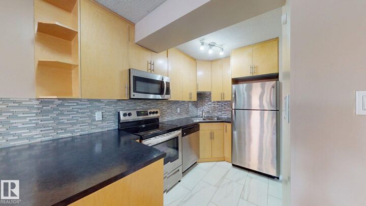 Property Photo: 10140 120 Street NW 307 AB T5K 1Z8