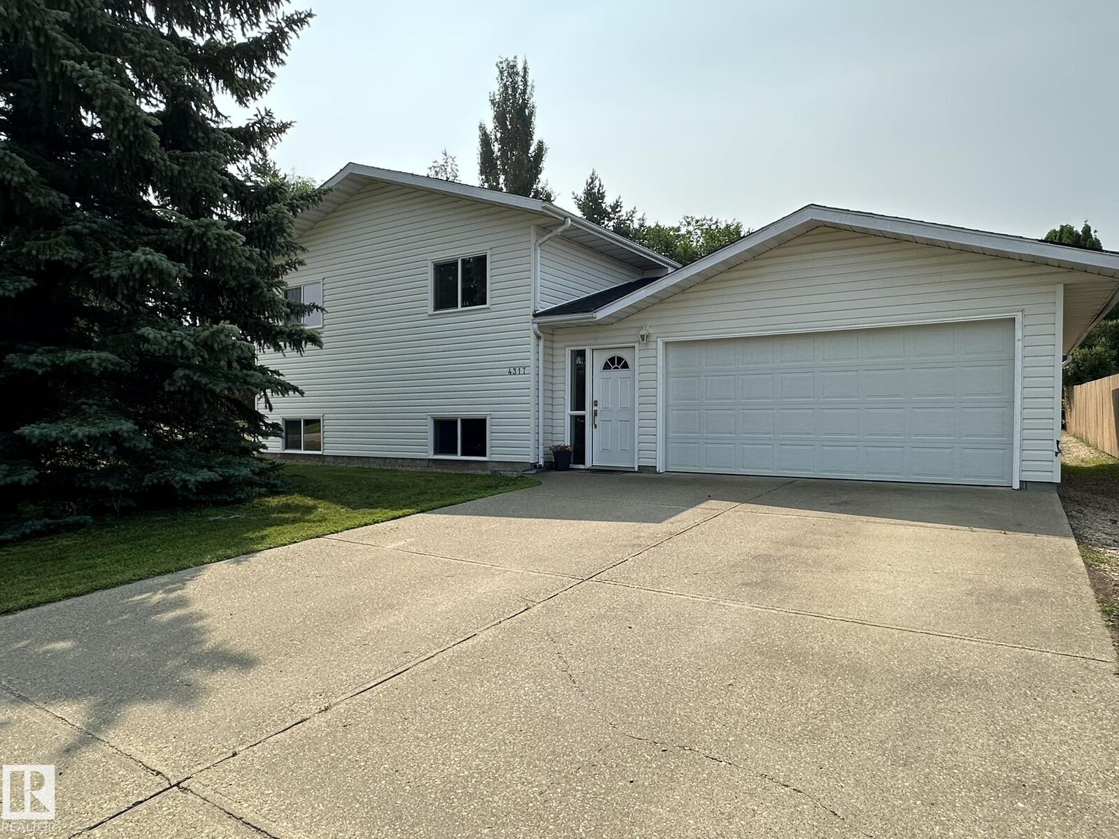 Property Photo: 4317 & 4309 54 Avenue AB T0A 3C0