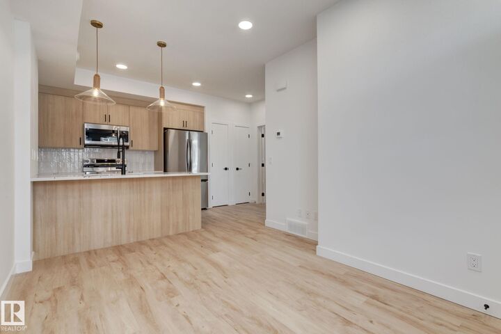 Property Photo: 16231 19 Avenue SW 1 AB T6W 5C6