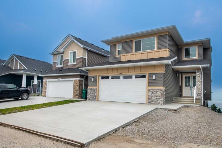 Property Photo: 495 Rivercrest View AB T4C 2W9