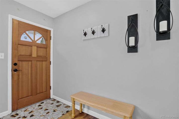 Property Photo:  2940 W Saratoga Avenue  CO 80110 