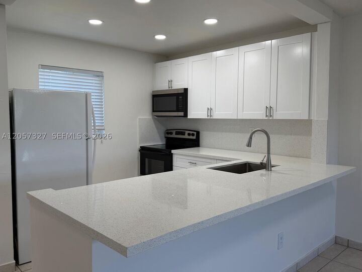 Property Photo:  7730 Camino Real F 406  FL 33143 