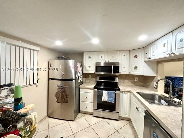 Property Photo: 3905 N Nob Hill Rd 312 FL 33351
