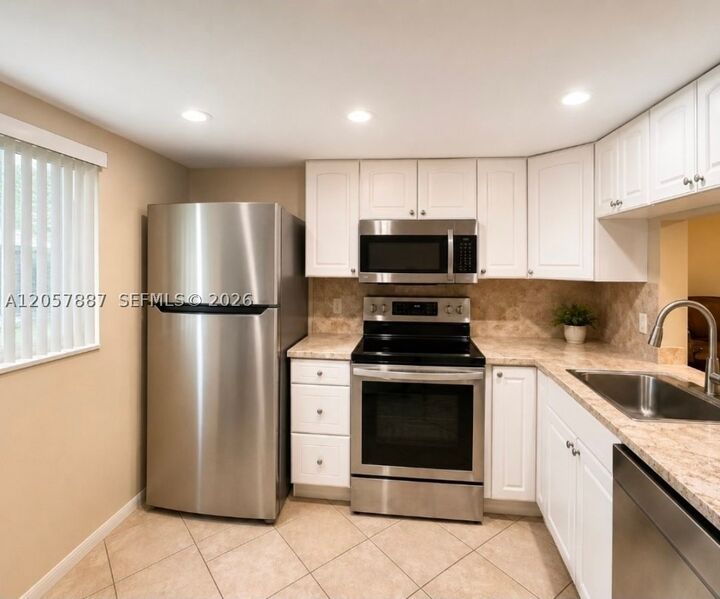 Property Photo: 3905 N Nob Hill Rd 312 FL 33351