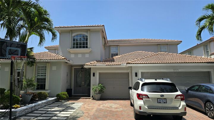 Property Photo:  19179 S Gardenia Ave  FL 33332 